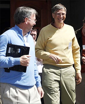 Eric Schmidt (L) CEO of Google, Bill Gates former CEO of Microsoft talk outside the Sun Valley Inn.