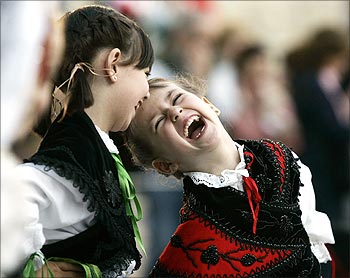 Children laugh during Muineira's Day (day of dancing) in Pontevedra, Spain.