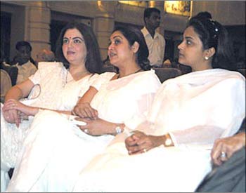 Mukesh Ambani's wife Nita (left) with Anil's wife Tina (centre).