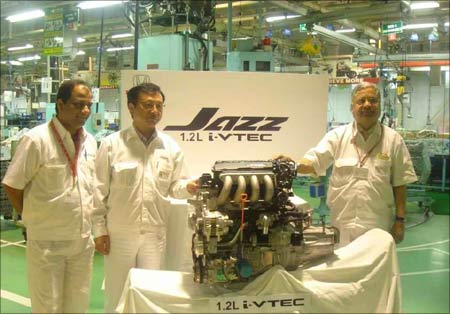 Top honchos of Honda Siel Cars India at the unveiling of Honda Jazz 1.2 L i-VTEC engine.