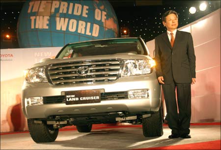 TKM managing director Hiroshi Nakagawa poses with the new Land Cruiser.