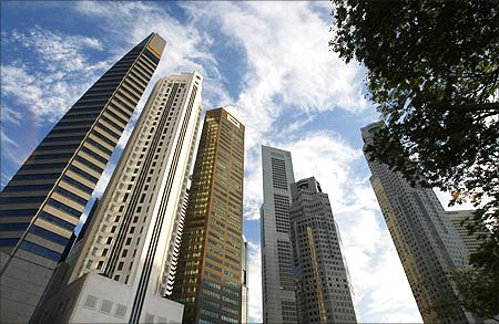 Housing banks and wealth management funds' offices are pictured in Singapore's financial district.