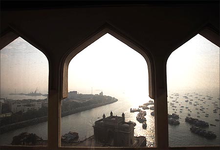 Gateway of India is seen through the window of a room in the Taj Mahal hotel in Mumbai.