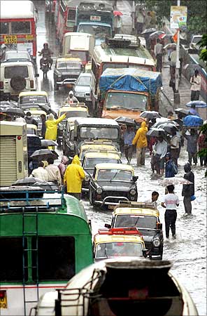 Vehicles are stuck in traffic jam due to flooded roads in Mumbai.