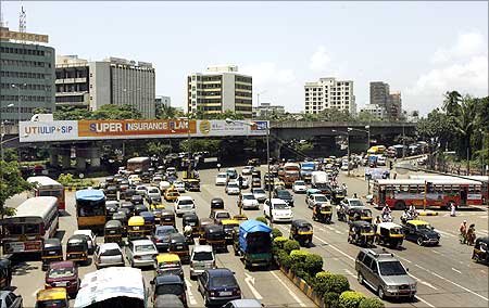 Vehicles move during busy traffic hours in India's financial hub Mumbai.