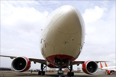 Air India's newly acquired Boeing 777-200 LR is on display at the tarmac of Mumbai airport.