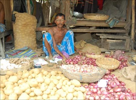 Image: A vegetable vendor. Photograph: Dipak Chakraborty