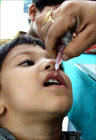 A child receives the polio vaccine in Bhopal.