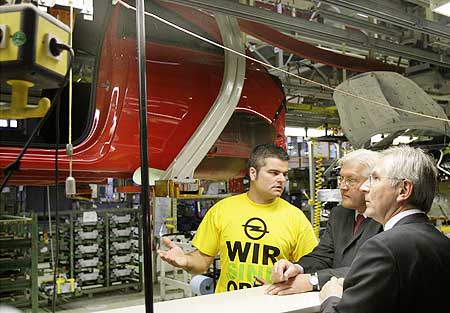 German Foreign Minster Frank-Walter Steinmeier and Opel CEO Hans Demant
