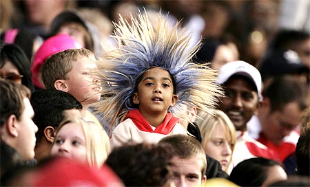 Cricket fans look on during the 2009 Indian Premier League (IPL) T20 cricket tournament between the Chennai Super Kings and the Delhi Daredevils at the Wanderers Stadium in Johannesburg.