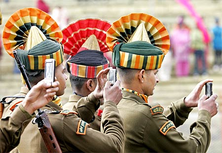 Ceremonially dressed soldiers in Srinagar, Kashmir, record the Republic Day celebrations.