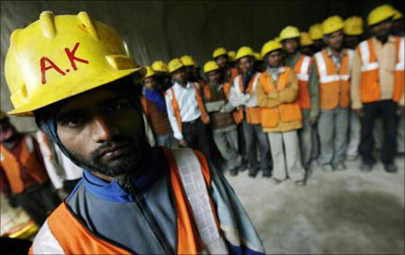 A Delhi Metro Rail Corporation worker.