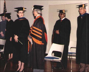 On graduation day, Jain is second from right with advisor Frank Bass.