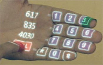 SixthSense can just project a dailler on your palm and you can call a number by tapping on the keys on your hand!