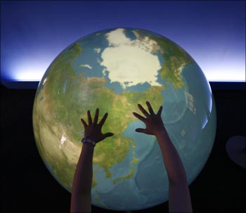 Tangible Earth, a digital globe in which real time global metrological data is fed through the Internet from about 300 places in the world.