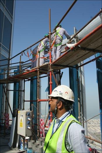 Contruction workers at the 124th floor (Observation deck) of the Burj Tower.