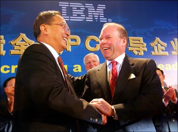 Lenovo chairman Liu Chuanzhi with John Joyce, Sr VP, IBM in Beijing.