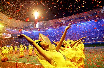 Performers dance during the closing ceremony of the Beijing 2008 Paralympic Games at the National Stadium.