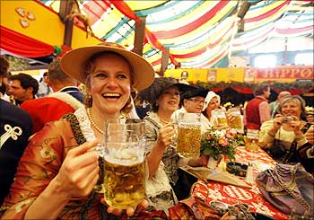 Women toast with beer during the 176th Oktoberfest in Munich.