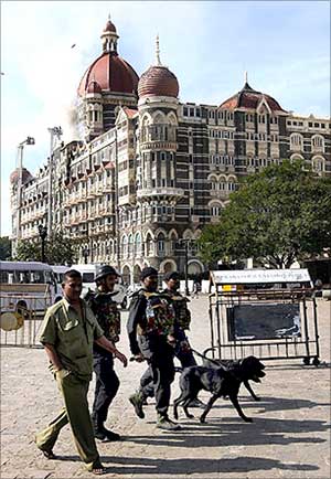 Police personnel outside Taj Mahal Hotel.