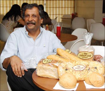 M Mahadevan with the goodies prepared at his Hot Breads bakery.