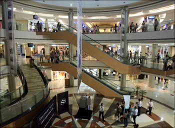 People stroll in Inorbit mall in Mumbai.