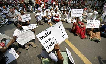 Communist activists hold placards during a protest against the World Trade Organisation in New Delhi.