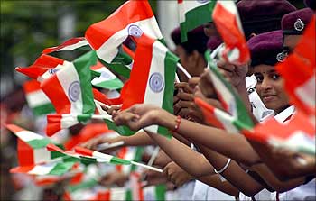School children wave India's national flag during the Independence Day celebrations in Chennai.