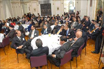 Potential investors listen to Kamal Nath's speech.