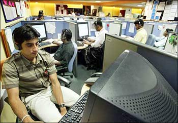 Workers at an Indian IT firm's office.