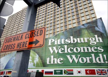 Signs are seen near the site of the upcoming G20 Pittsburgh summit in Pittsburgh, Pennsylvania.