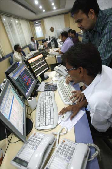 Stock traders at work in Mumbai.