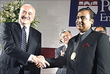 Mukesh Ambani receives the Dean's Medal from Eduardo Glandt, University of Pennsylvania's School of Engineering and Applied Science.