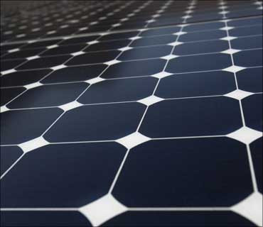 Solar panels sit on the roof of SunPower Corporation in Richmond, California.