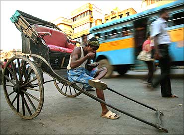 A rickshaw puller takes a break in Kolkata.