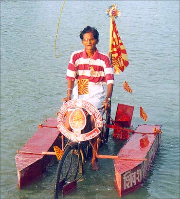 Dwarka Prasad in the amphibious cycle.