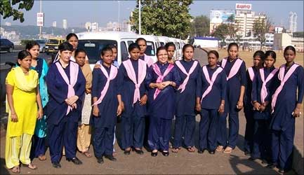 Revathi Roy (centre) with her staff.