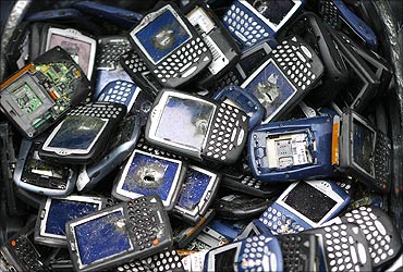 Trashed Blackberry phones sit in a bucket during the NBC Today Show in New York.