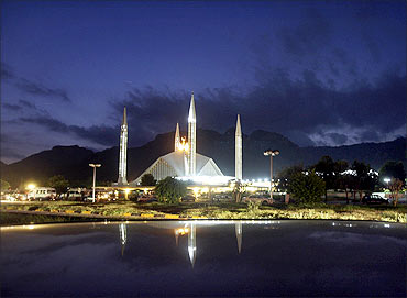 Clouds are pictured over the Faisal Mosque in Islamabad.
