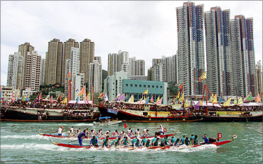 A dragon boat race at Hong Kong's Aberdeen fishing port.