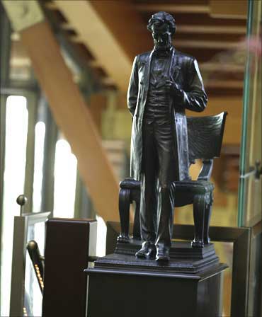 A statue of Abraham Lincoln stands just inside the entryway of the house.