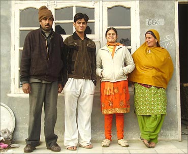 Dharamveer with his family.