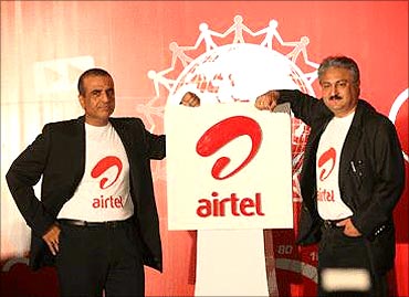 Sunil Mittal, chairman, Bharti Airtel and Sanjay Kapoor, CEO, Bharti Airtel (R).