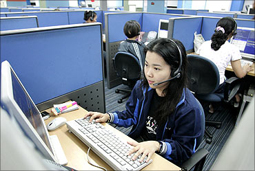 Employees at a call centre in Manila.