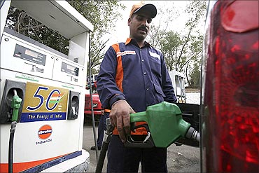 A worker at an Indian Oil petrol pump.