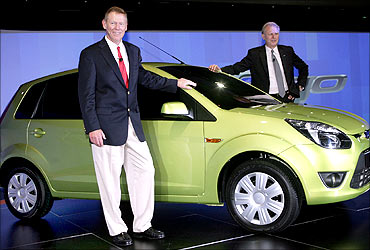 Ford president and CEO Alan Mulally (left) andFord Motor India Co president and MD Michael Boneham with Figo.