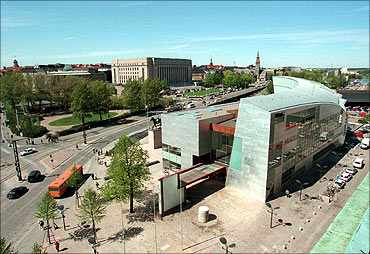 Finland's museum of modern art, 'Kiasma' , in Helsinki with the House of Paliament in the background