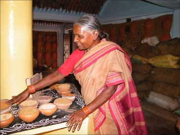 Chandramma showing her seed collection.