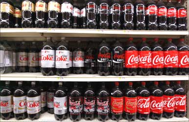 Bottles of Coca Cola on display in a store in New York.