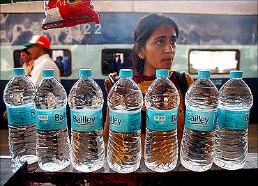 A passenger purchasing bottled water.